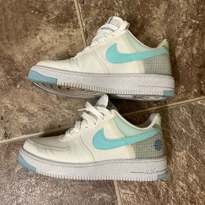 Nike Air Force ones made from recycled material blue